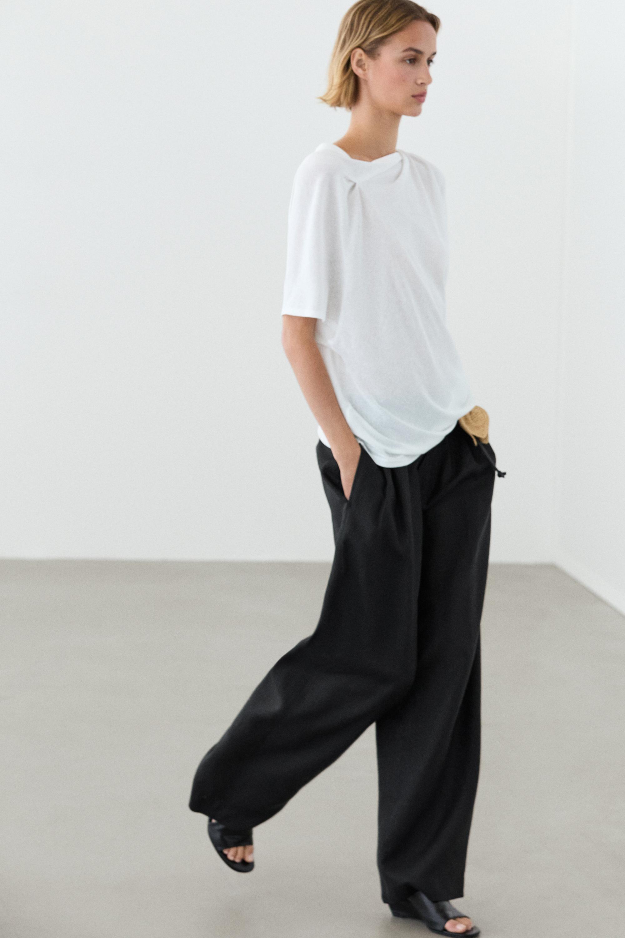 Wide-leg pleated linen trousers